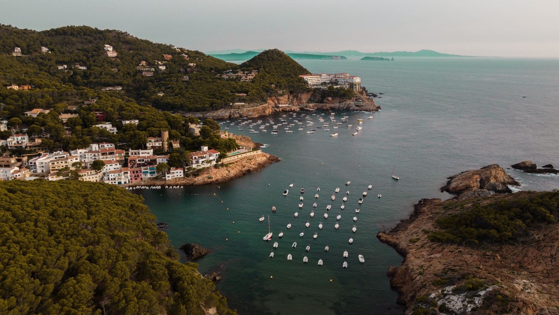 Moored boats in a cove below Begur